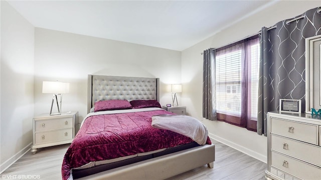 bedroom featuring light hardwood / wood-style floors