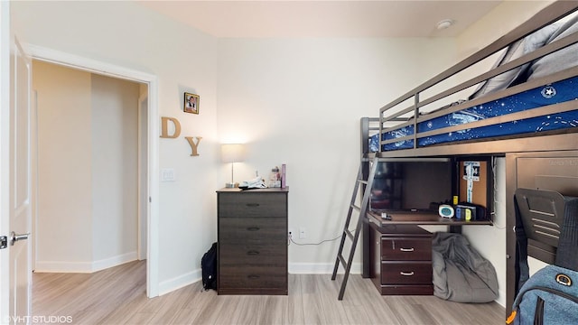 bedroom featuring light wood-type flooring