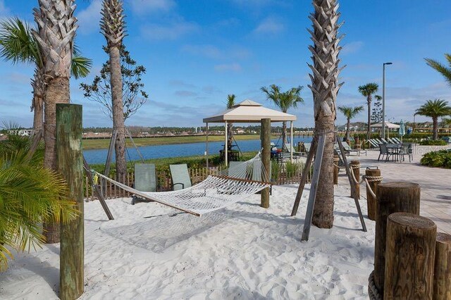 4839 Kings Castle Cir, Kissimmee, FL 34746 - view of community with a gazebo and a water view