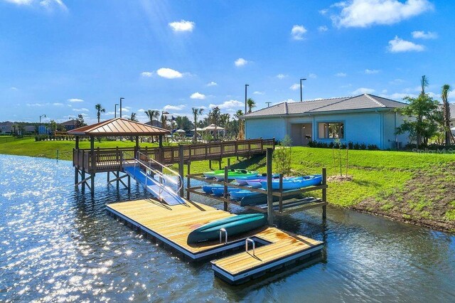 4839 Kings Castle Cir, Kissimmee, FL 34746 - dock area with a yard, a gazebo, and a water view