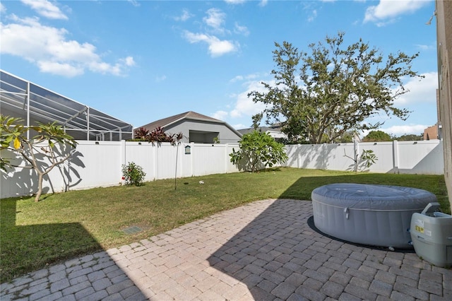 view of patio with glass enclosure