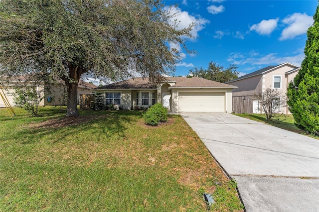 ranch-style home with a front yard and a garage