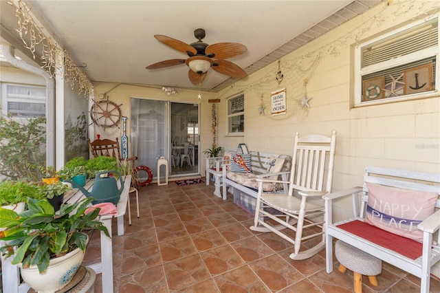 view of patio / terrace featuring ceiling fan