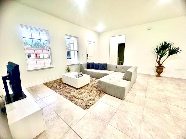 living room with light tile patterned flooring