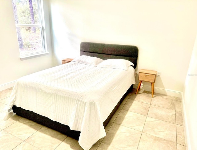 bedroom with tile patterned flooring