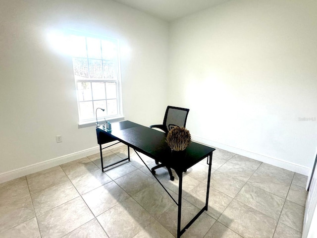 office area featuring light tile patterned floors