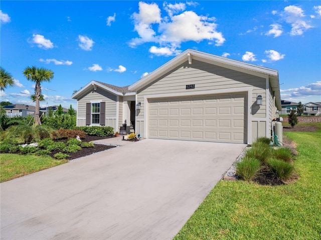 single story home with a front yard and a garage