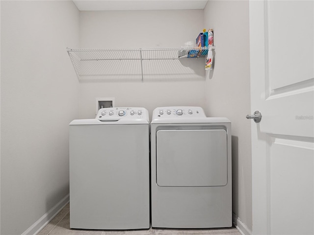 laundry area featuring separate washer and dryer