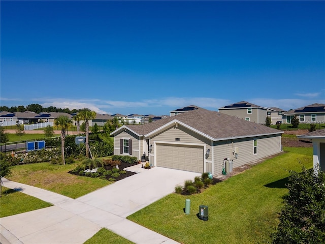 single story home with a front yard and a garage