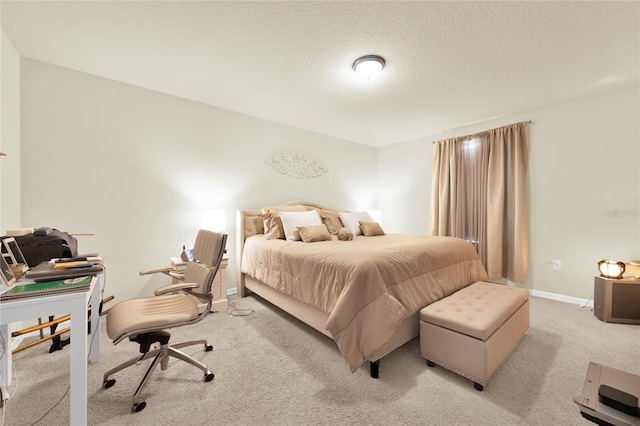 carpeted bedroom with a textured ceiling