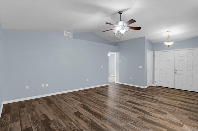 interior space with vaulted ceiling, dark hardwood / wood-style floors, and ceiling fan