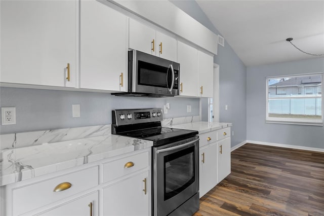 kitchen featuring lofted ceiling, appliances with stainless steel finishes, dark hardwood / wood-style floors, and white cabinetry