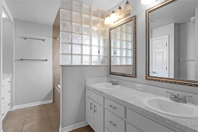 bathroom with vanity and tile patterned flooring