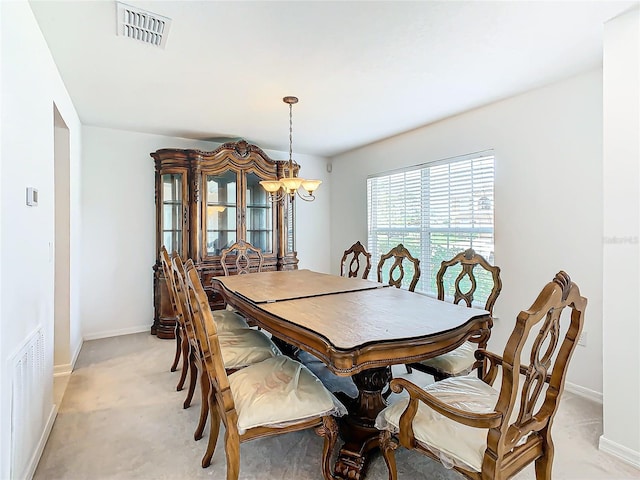 dining area with a chandelier