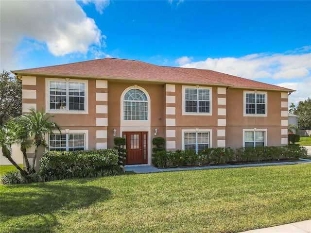 view of front of property with a front lawn