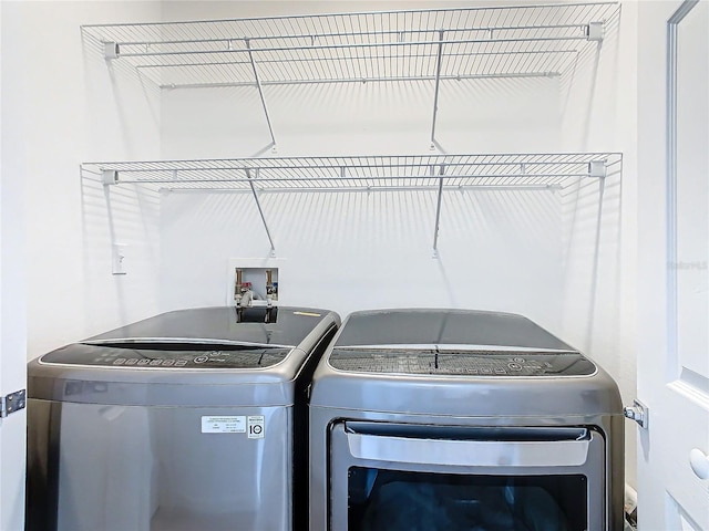 laundry area featuring washer and clothes dryer