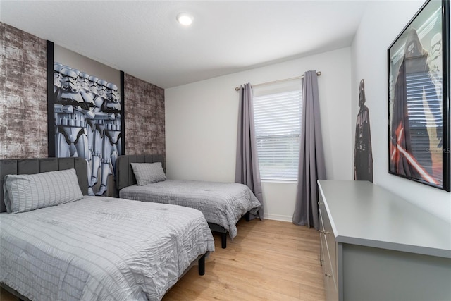 bedroom featuring light wood-type flooring