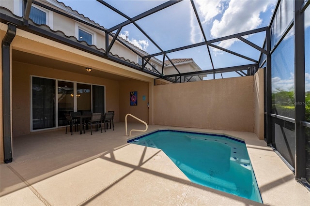 view of pool featuring a patio area and a lanai