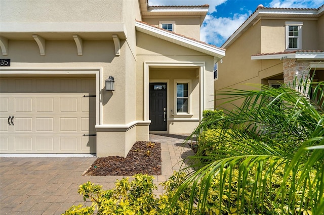 property entrance featuring a garage