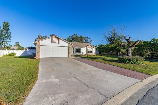 ranch-style house with a garage and a front lawn