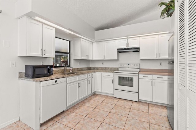 1402 Westminster Way, Kissimmee, FL 34744 - kitchen featuring white appliances, under cabinet range hood, white cabinets, a sink, and light tile patterned floors