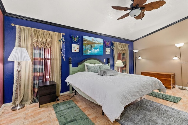 bedroom featuring crown molding, vaulted ceiling, and ceiling fan