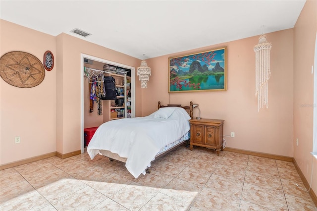 bedroom featuring a closet and tile patterned flooring