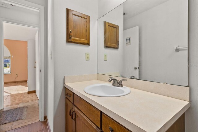 1402 Westminster Way, Kissimmee, FL 34744 - bathroom with vanity and tile patterned floors
