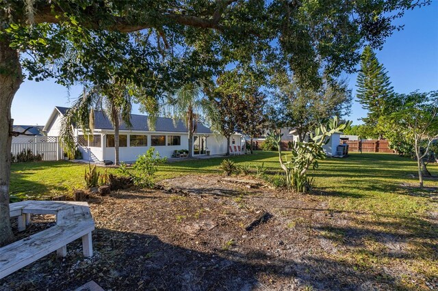 1402 Westminster Way, Kissimmee, FL 34744 - view of yard with a sunroom