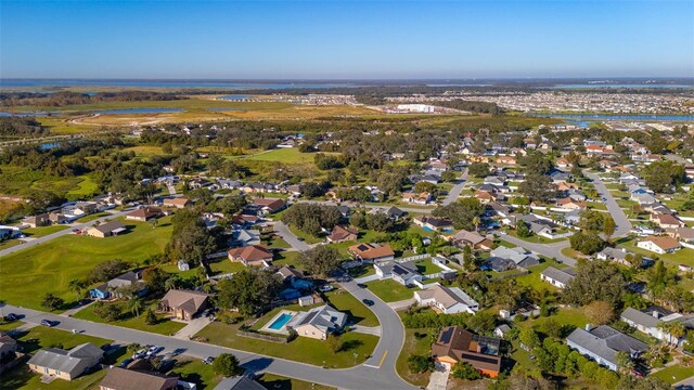 1402 Westminster Way, Kissimmee, FL 34744 - aerial view of property's location featuring a nearby body of water and nearby suburban area
