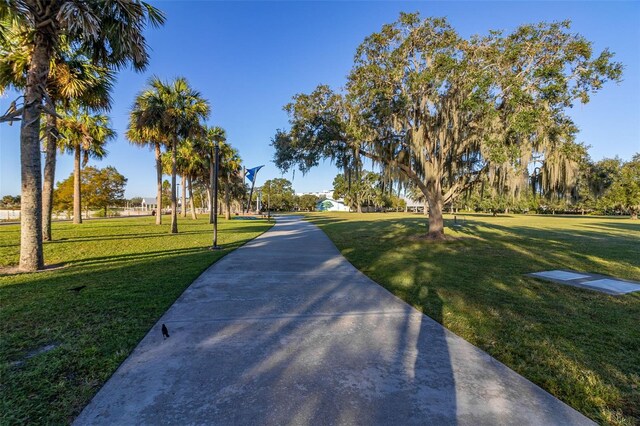 1402 Westminster Way, Kissimmee, FL 34744 - view of home's community featuring a yard
