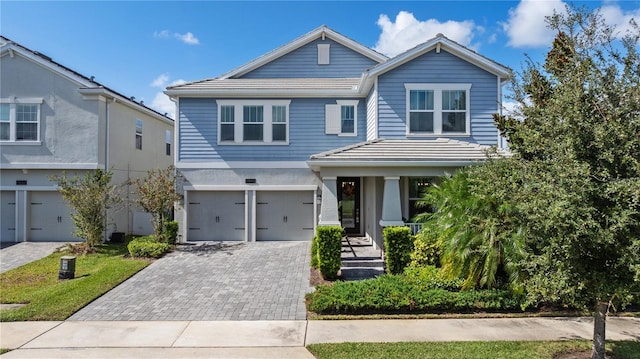 front of property with a garage