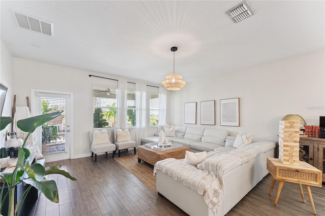 living room with dark hardwood / wood-style floors