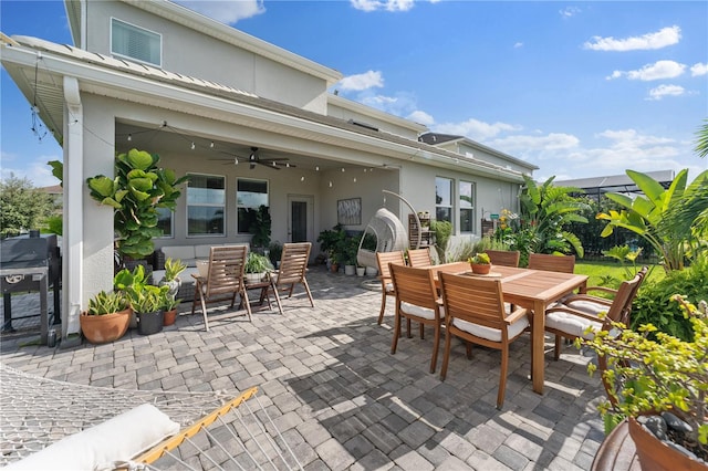 view of patio / terrace featuring ceiling fan