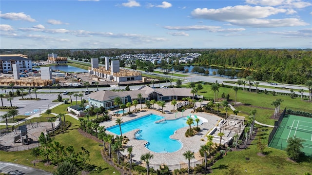 bird's eye view with a water view