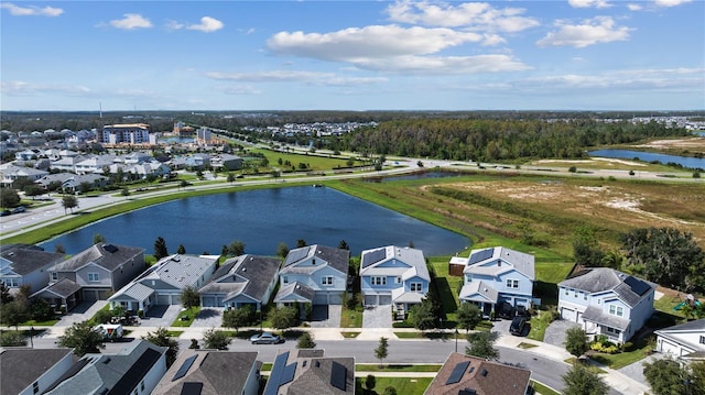 bird's eye view with a water view