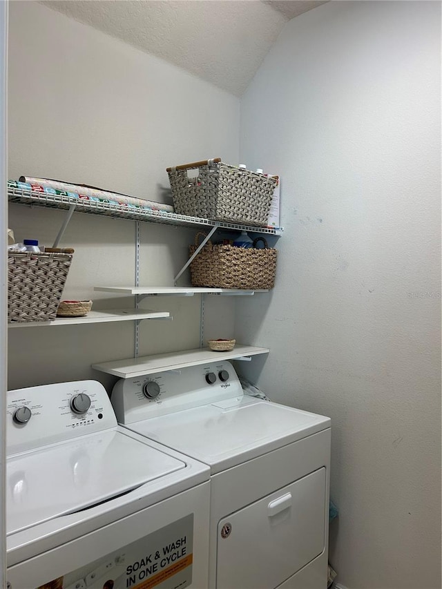 laundry area featuring washer and clothes dryer