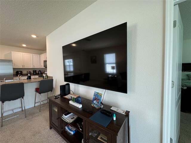 interior space featuring a textured ceiling