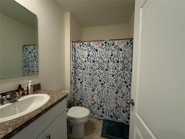 bathroom with vanity, a shower with shower curtain, a textured ceiling, and toilet