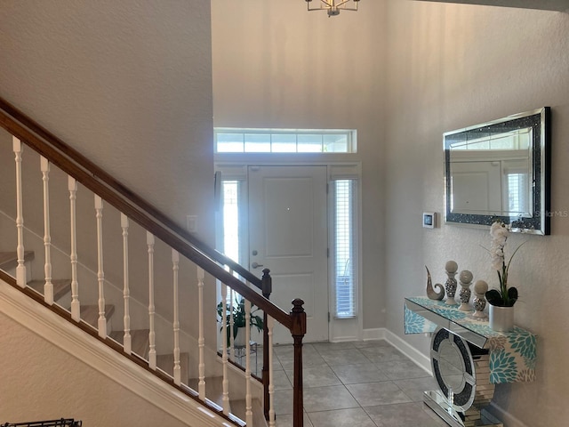 entrance foyer featuring light tile patterned floors