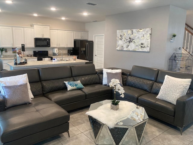 tiled living room with sink