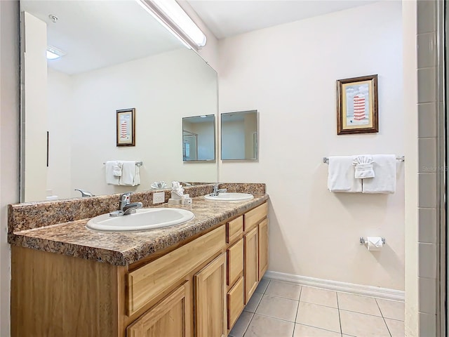 bathroom with vanity and tile patterned flooring