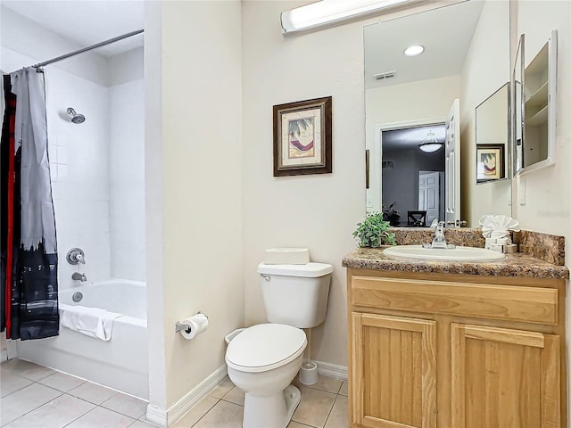 full bathroom featuring toilet, shower / bath combo, vanity, and tile patterned floors