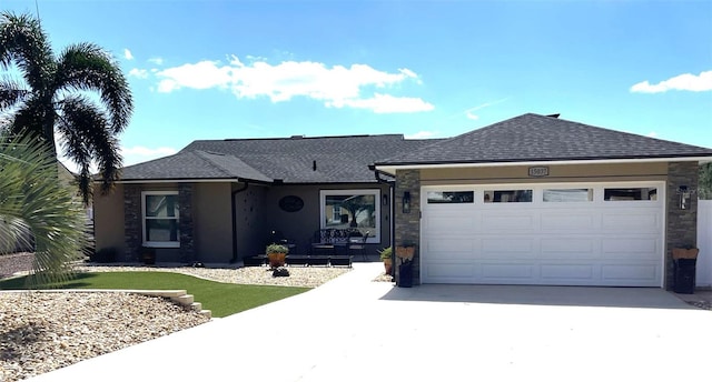 ranch-style house featuring a garage