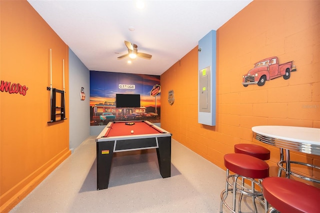 game room with pool table and ceiling fan