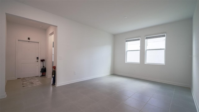 view of tiled spare room