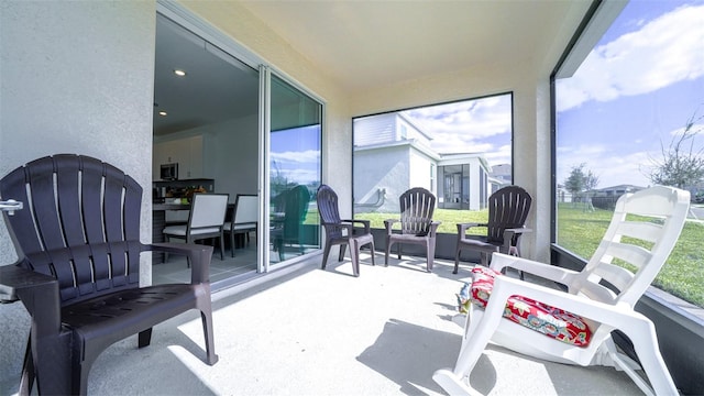 sunroom featuring plenty of natural light