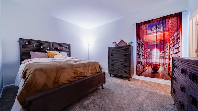 bedroom with vaulted ceiling and carpet flooring