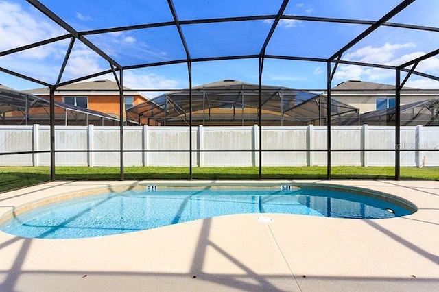 view of pool featuring a patio area and a lanai