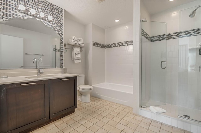 full bathroom with vanity, shower with separate bathtub, toilet, and tile patterned flooring